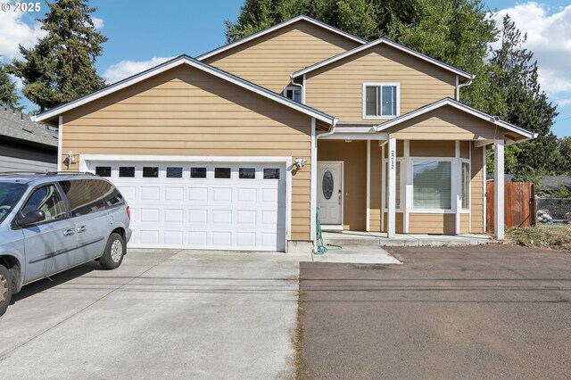 view of front of property featuring a garage