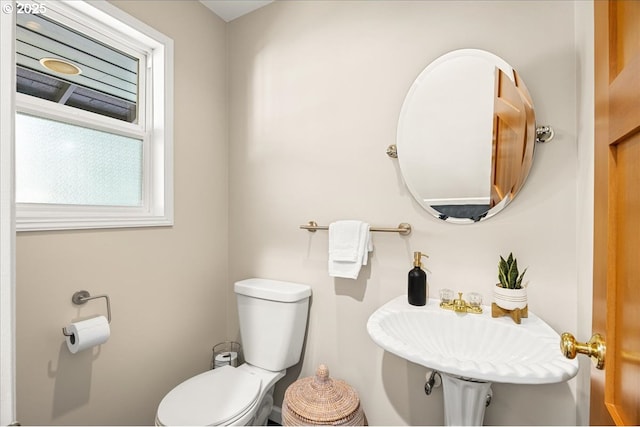 bathroom featuring toilet