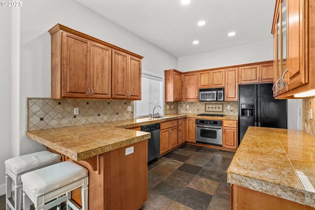 465 Covey Ln, Eugene, OR 97401 - kitchen featuring stainless steel appliances, tile countertops, a peninsula, recessed lighting, and a sink