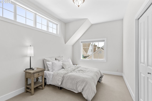 465 Covey Ln, Eugene, OR 97401 - bedroom featuring multiple windows, light colored carpet, and baseboards