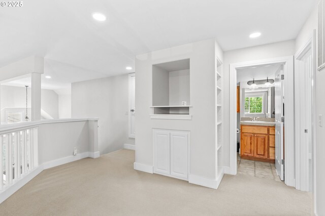 465 Covey Ln, Eugene, OR 97401 - corridor with light carpet, recessed lighting, and a sink