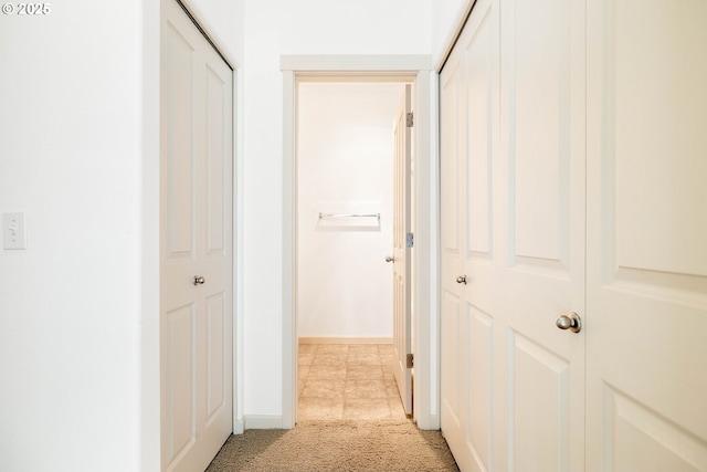 11830 NW Holly Springs Ln Unit 406, Portland, OR 97229 - hall featuring light colored carpet and baseboards