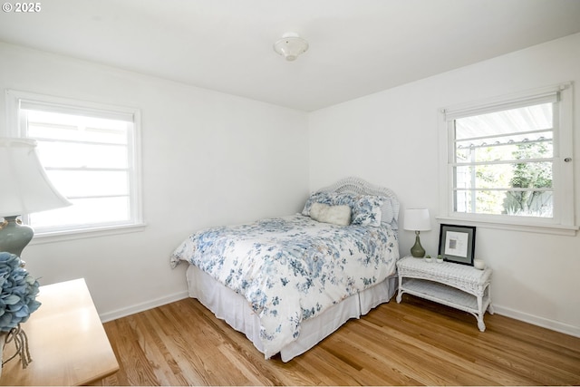 2535 N Baldwin St, Portland, OR 97217 - bedroom featuring light wood-style floors and baseboards