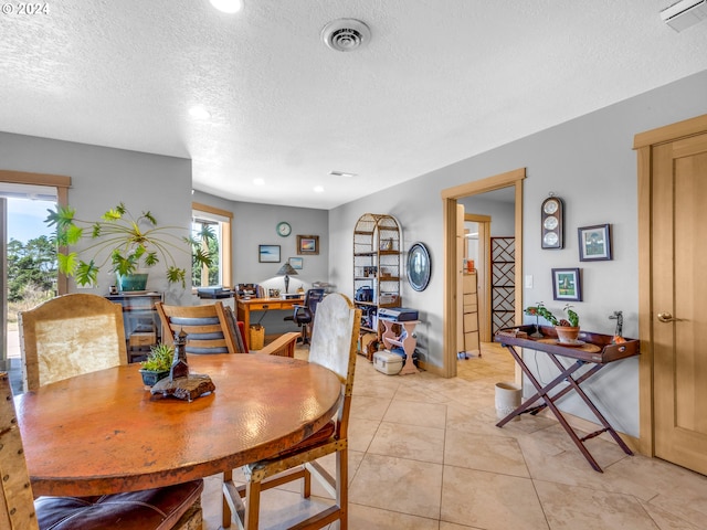 89610 Sea Breeze Dr, Warrenton, OR 97146 - dining space with recessed lighting, light tile patterned flooring, visible vents, and a textured ceiling