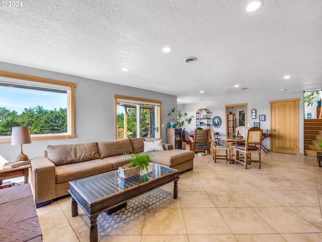 89610 Sea Breeze Dr, Warrenton, OR 97146 - living area featuring visible vents, recessed lighting, and a textured ceiling