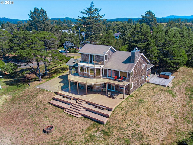 89610 Sea Breeze Dr, Warrenton, OR 97146 - birds eye view of property featuring a forest view and a mountain view