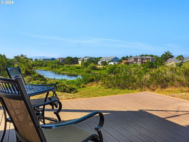 89610 Sea Breeze Dr, Warrenton, OR 97146 - deck with a water view and a residential view