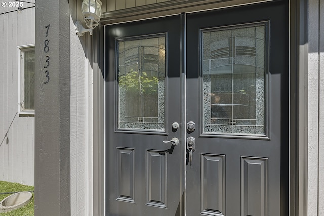 property entrance featuring french doors