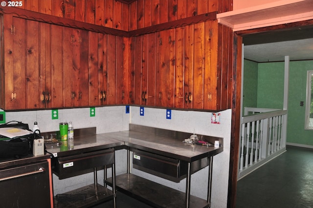 61021 Landreth Ln, Saint Helens, OR 97051 - kitchen featuring decorative backsplash and wood walls