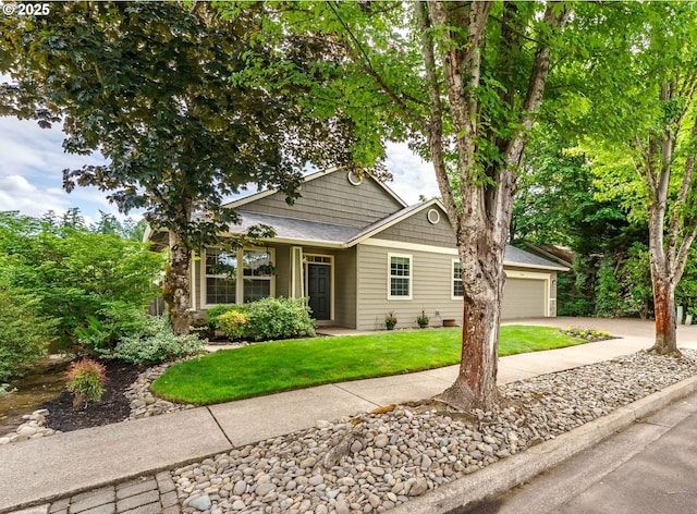1216 SE 47th St, Hillsboro, OR 97123 - view of front facade with concrete driveway, an attached garage, and a front lawn