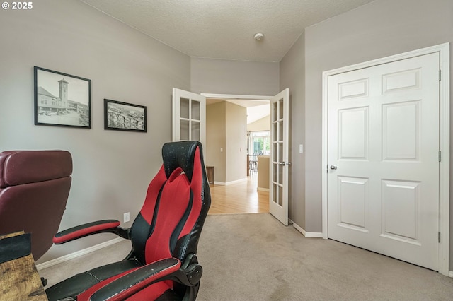 1216 SE 47th St, Hillsboro, OR 97123 - home office with light carpet, baseboards, and french doors