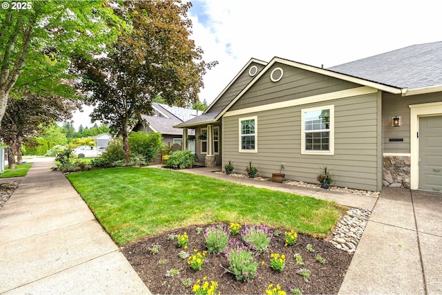 1216 SE 47th St, Hillsboro, OR 97123 - view of property exterior with a lawn and roof with shingles