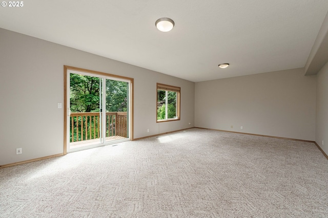 1216 SE 47th St, Hillsboro, OR 97123 - empty room featuring baseboards and carpet flooring