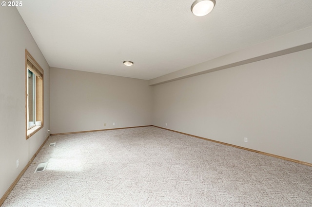 1216 SE 47th St, Hillsboro, OR 97123 - carpeted empty room with baseboards