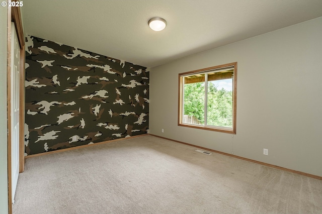 1216 SE 47th St, Hillsboro, OR 97123 - carpeted empty room with baseboards