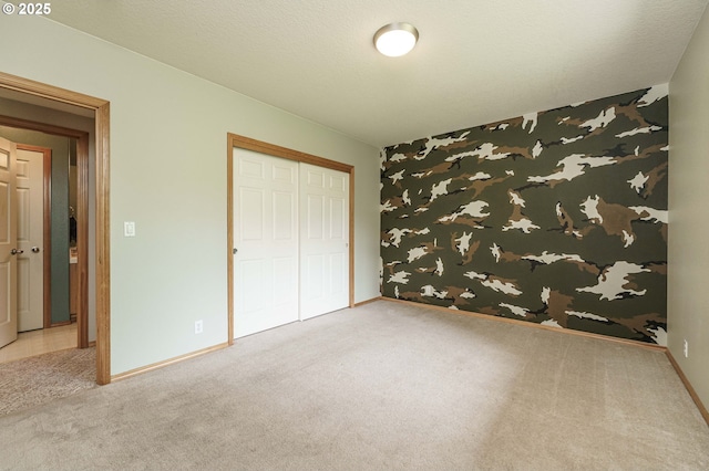 1216 SE 47th St, Hillsboro, OR 97123 - unfurnished bedroom featuring carpet, a closet, and baseboards