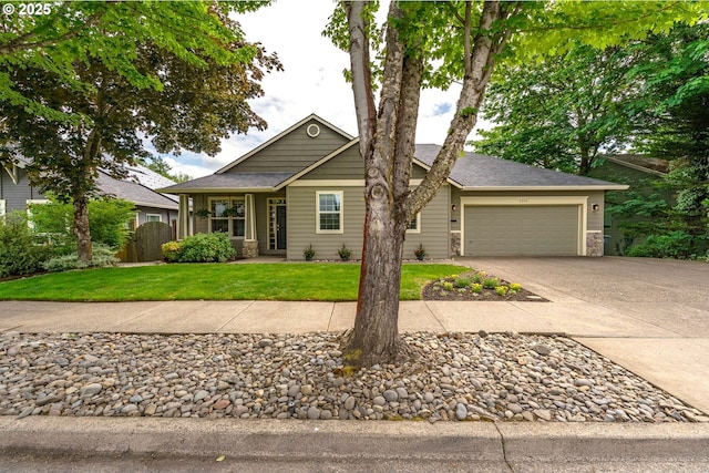 1216 SE 47th St, Hillsboro, OR 97123 - view of front of property featuring a garage, concrete driveway, and stone siding