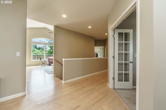 1216 SE 47th St, Hillsboro, OR 97123 - hallway with wood finished floors, recessed lighting, baseboards, and lofted ceiling