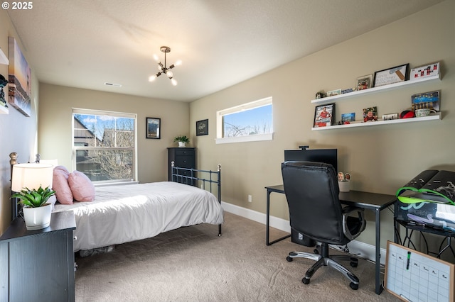 bedroom featuring a chandelier, carpet flooring, multiple windows, and baseboards