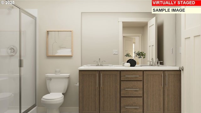 full bath with a stall shower, toilet, baseboards, a sink, and double vanity