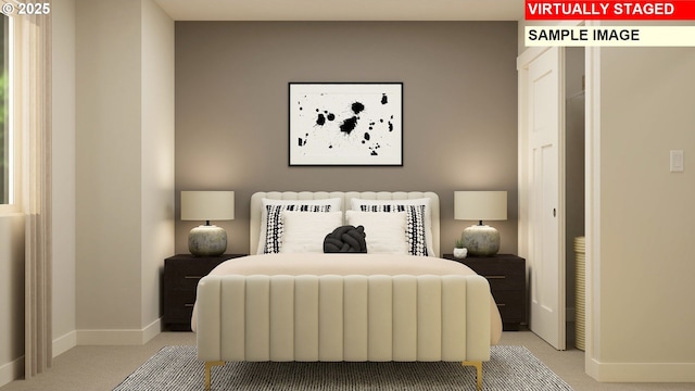 bedroom with baseboards and light carpet