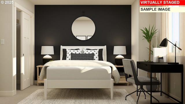 bedroom with baseboards and carpet floors
