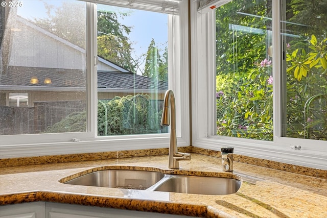8967 SW Leslie St, Portland, OR 97223 - kitchen view of a sink and light stone counters