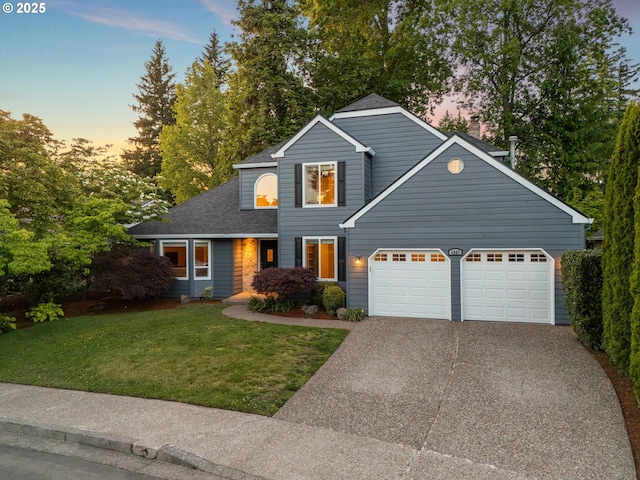 8967 SW Leslie St, Portland, OR 97223 - traditional-style house featuring an attached garage, a front yard, driveway, and a shingled roof