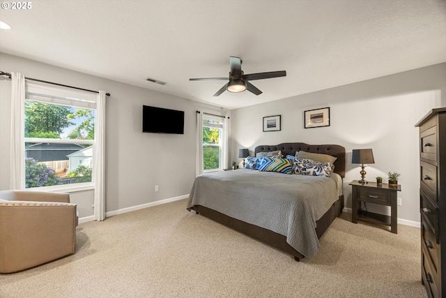 8967 SW Leslie St, Portland, OR 97223 - bedroom featuring light carpet, baseboards, and a ceiling fan
