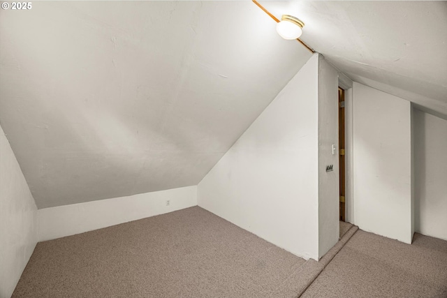 8967 SW Leslie St, Portland, OR 97223 - additional living space featuring vaulted ceiling and carpet floors