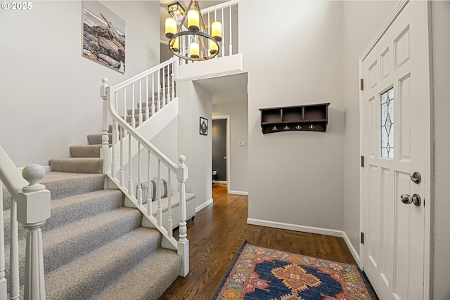 8967 SW Leslie St, Portland, OR 97223 - foyer featuring stairway, baseboards, a chandelier, wood finished floors, and a towering ceiling