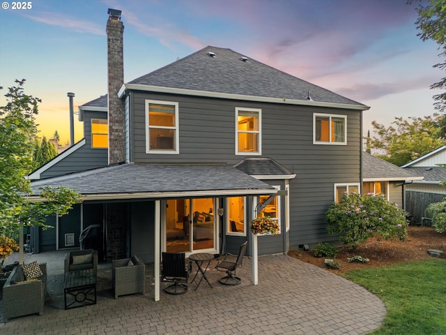 8967 SW Leslie St, Portland, OR 97223 - back of house with roof with shingles and a patio