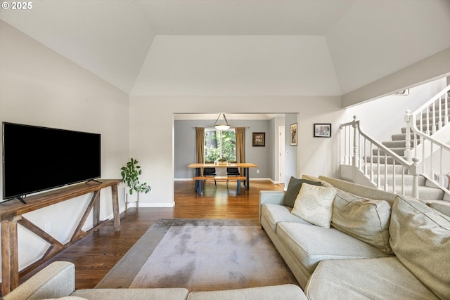 8967 SW Leslie St, Portland, OR 97223 - living area featuring vaulted ceiling, wood finished floors, baseboards, and stairway