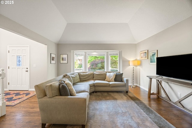 8967 SW Leslie St, Portland, OR 97223 - living room featuring wood finished floors, lofted ceiling, and baseboards