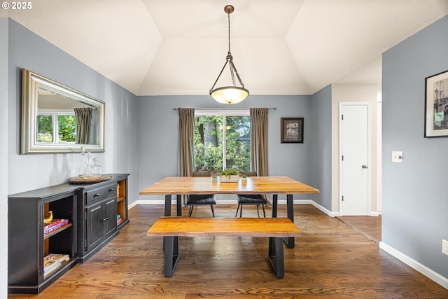 8967 SW Leslie St, Portland, OR 97223 - dining space featuring wood finished floors, vaulted ceiling, and baseboards