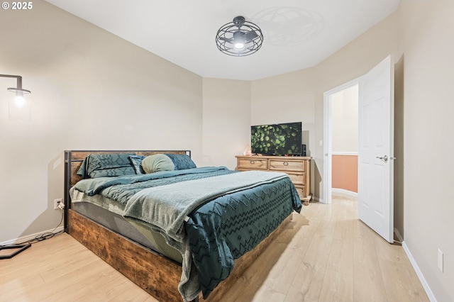 bedroom with light hardwood / wood-style flooring