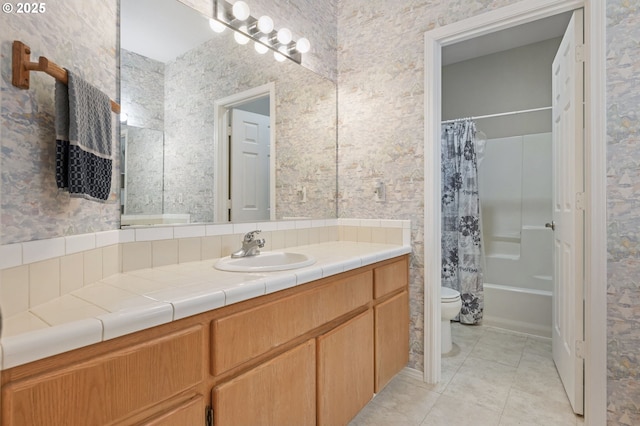 full bathroom with tile patterned flooring, vanity, shower / bath combo, and toilet