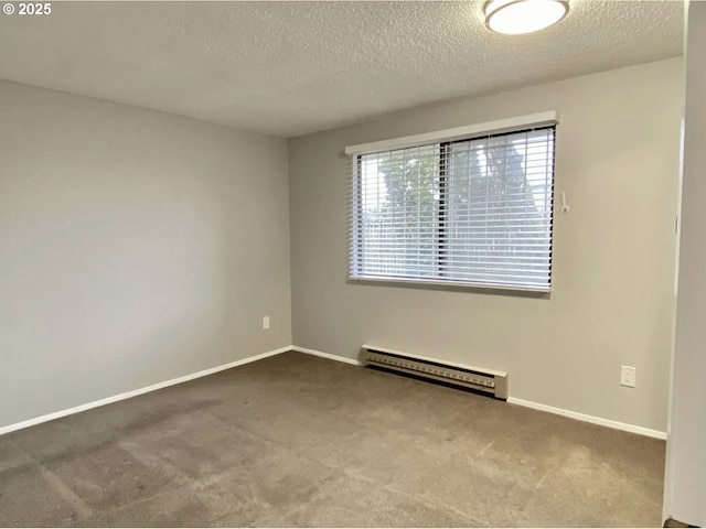 8416 SE Insley St, Portland, OR 97266 - carpeted empty room with baseboard heating, baseboards, and a textured ceiling