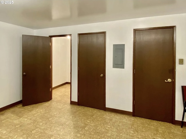 8416 SE Insley St, Portland, OR 97266 - unfurnished bedroom featuring baseboards, light floors, and electric panel