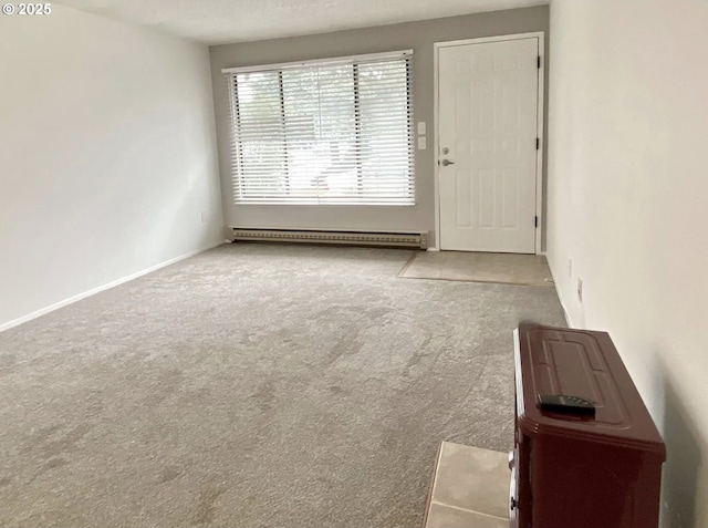 8416 SE Insley St, Portland, OR 97266 - carpeted empty room with baseboards and baseboard heating
