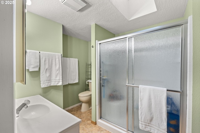 49855 Mckenzie Hwy, Vida, OR 97488 - full bath featuring toilet, a shower stall, vanity, a textured ceiling, and tile patterned floors