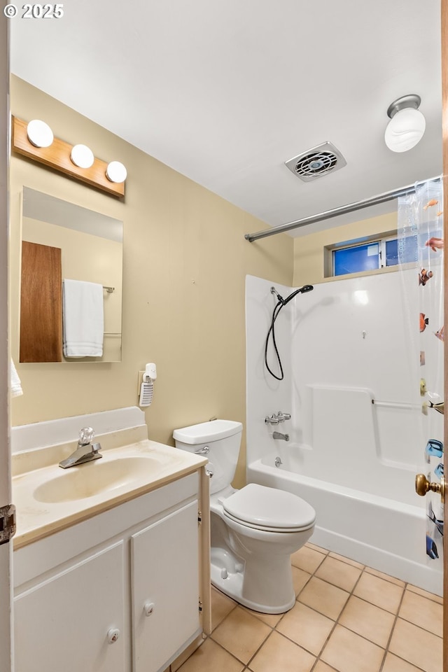 full bathroom featuring tile patterned floors, toilet, bathing tub / shower combination, and vanity