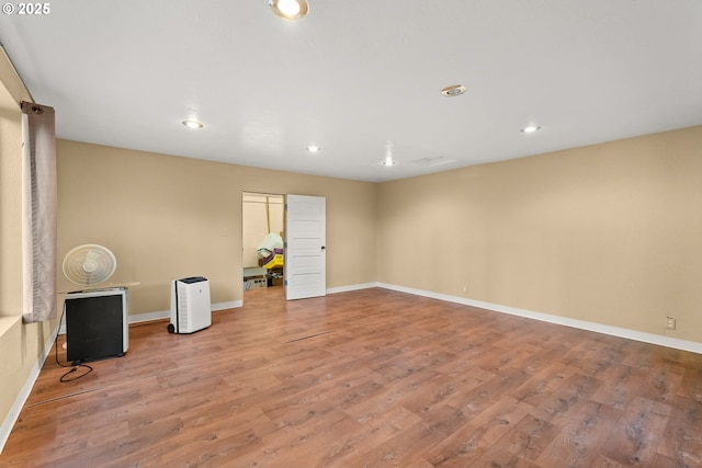 unfurnished room featuring light hardwood / wood-style flooring