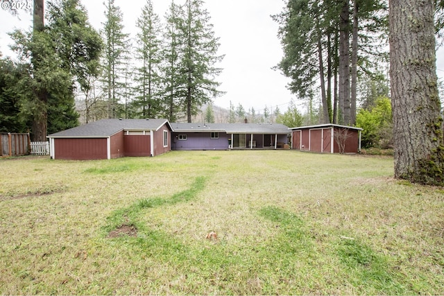 view of yard featuring a sunroom