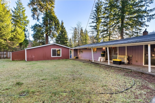 49855 Mckenzie Hwy, Vida, OR 97488 - rear view of house with a yard, a deck, and a chimney