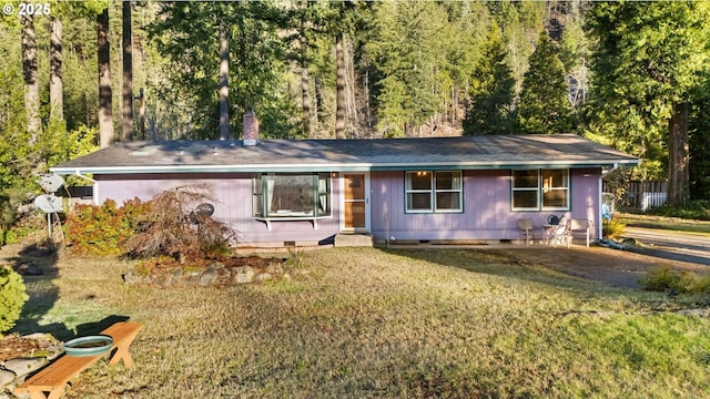 49855 Mckenzie Hwy, Vida, OR 97488 - single story home featuring crawl space, a front lawn, and a chimney
