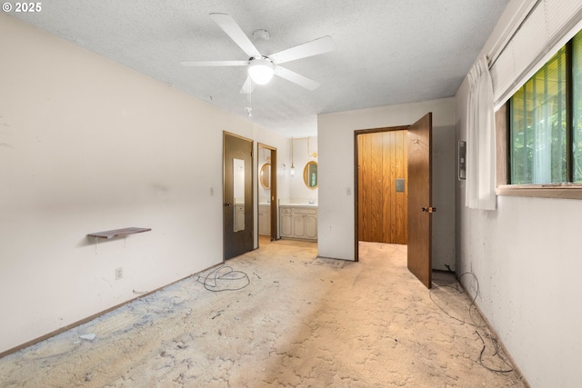 16739 NE Glisan St, Gresham, OR 97230 - unfurnished bedroom featuring a textured ceiling and ensuite bath