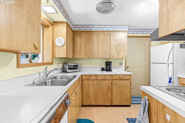 1120 N Lupine Ct, Canby, OR 97013 - kitchen with white appliances, light countertops, light wood finished floors, and a textured ceiling