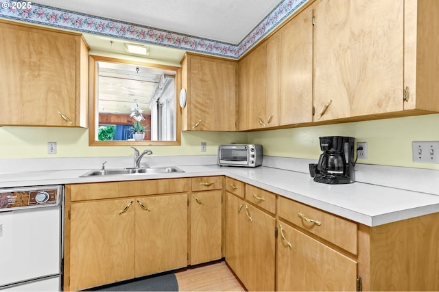 1120 N Lupine Ct, Canby, OR 97013 - kitchen featuring dishwasher and light countertops