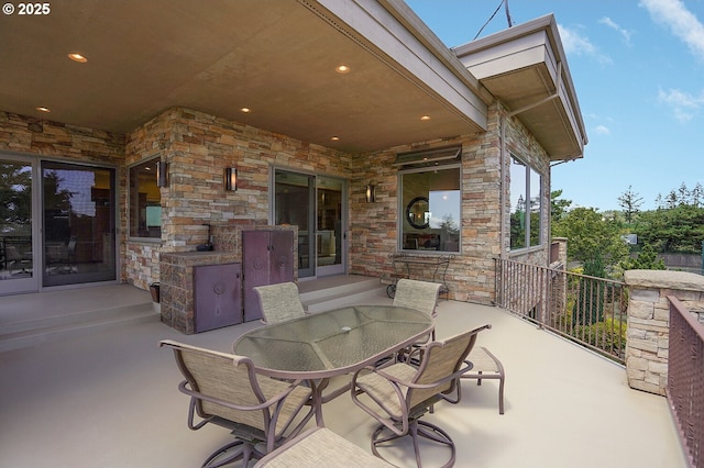 view of patio featuring outdoor dining space